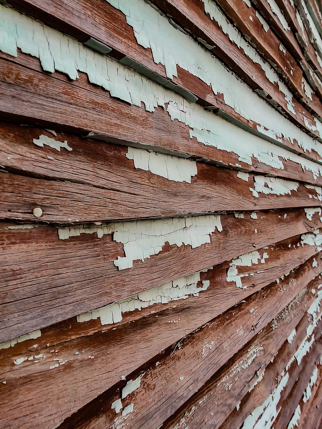 Peeling paint on old house in Dubois, Wyoming