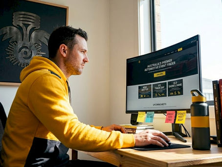 Man browsing event discovery platform at desk