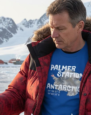 Male scientist with Palmer Station Tee shirt working in Antarctica