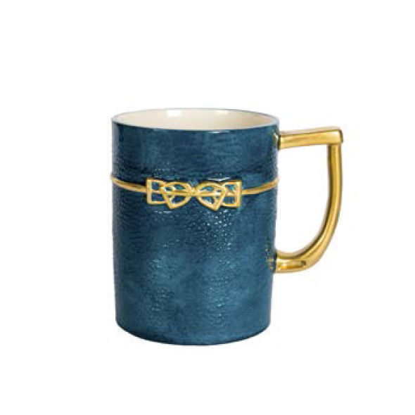 Hand-painted Italian mug in navy blue with a gold bow.