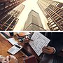 Skyscrapers and business person reviewing floor plans.