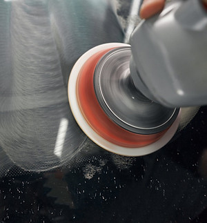 photo-of-car-polishing-in-automobile-repair-shop-