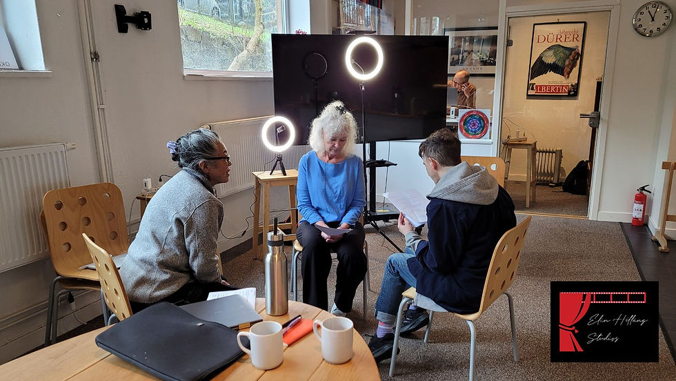 Three acting students prepare to act on a course in Selftapes and Audition technique at Elin Hilläng Studios. They are sitting on a chair each, in a circle.