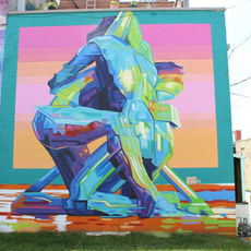 Sol Occasum by Chuck Berrett in 2020. Two human figures embrace on a pink and orange background with a teal trim.