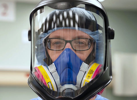 Candid moments sometimes produce the best photos. This medical doctor was captured in action during the midst of a global epidemic. 

