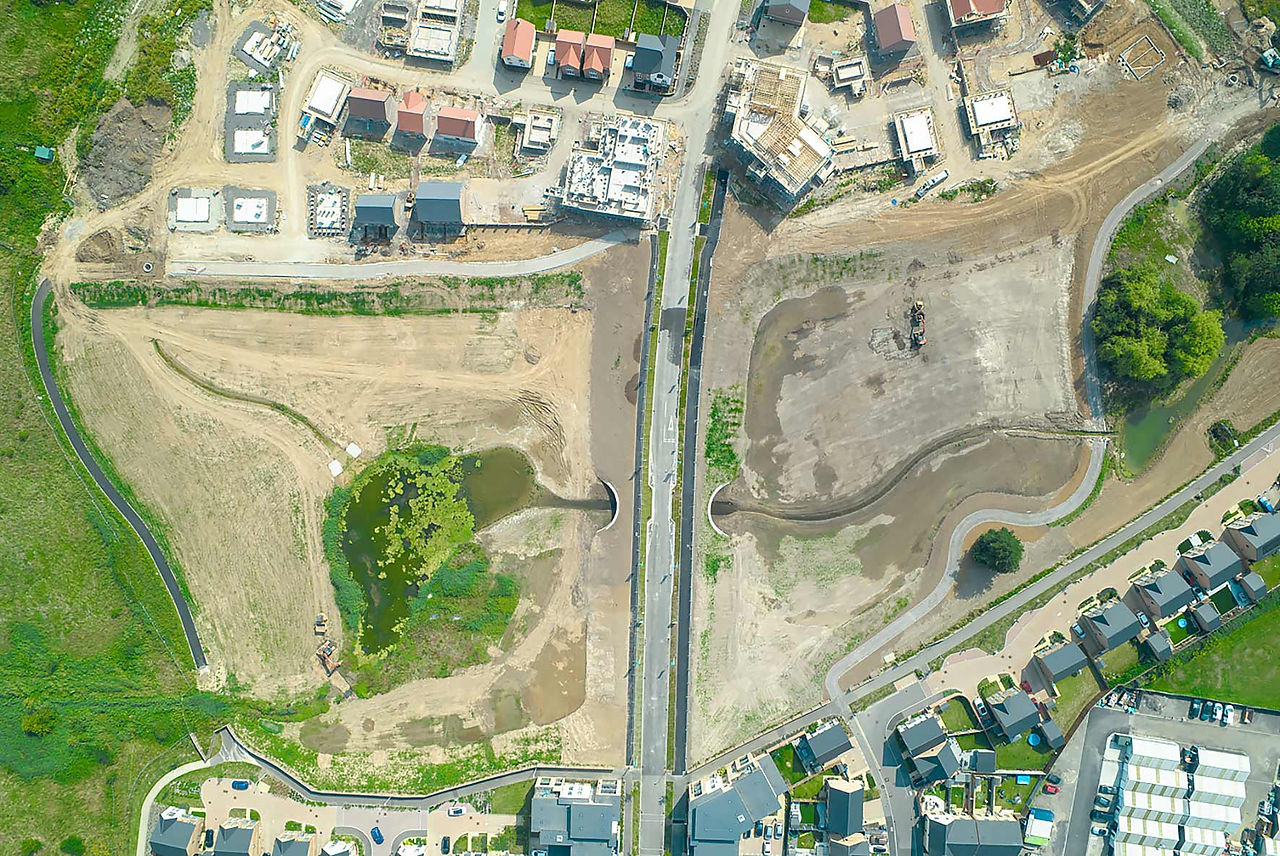 Aerial photo of road over a stream