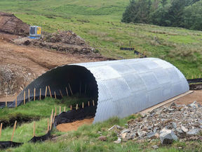 Steel arch over water