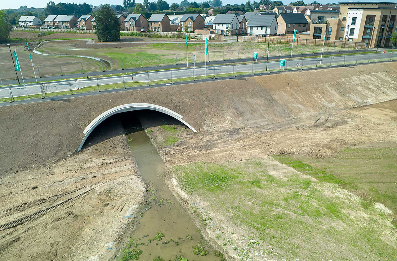Concrete arch with road above