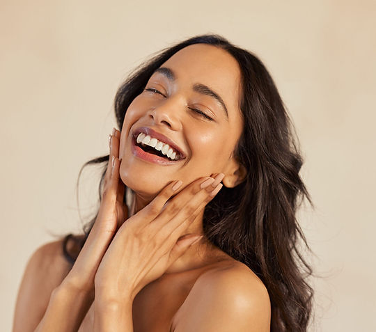 Beautiful-laughing-woman-touching-her-skin-with-joy-scaled-e1721404351198.jpeg