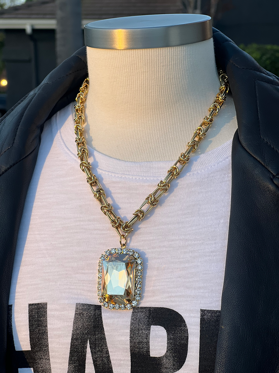 Gold Base Gold Crystal Necklace on white t shirt