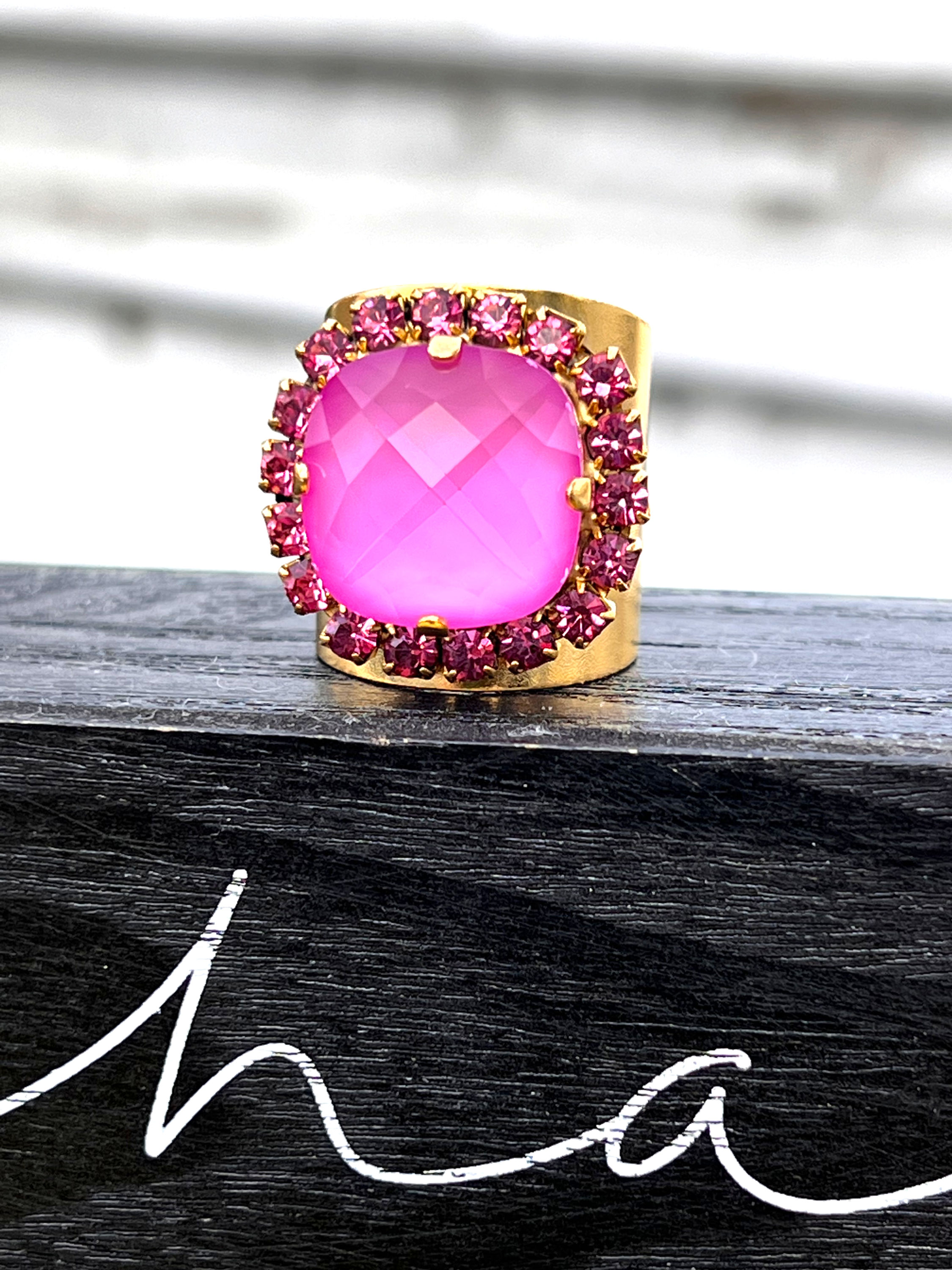 Barbie Pink Gold Statement Ring on black sign