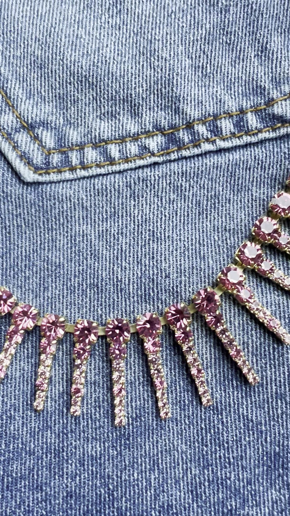 Thumbnail: Pink Crystal Ombre Necklace Gold Chain on jeans