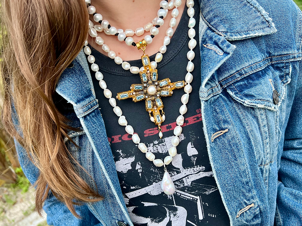 Thumbnail: Aquamarine and Gold Cross on Balinese Pearls with black t shirt and blue denim jacket