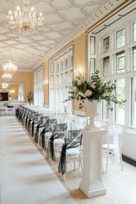statement flower urns for wedding ceremony