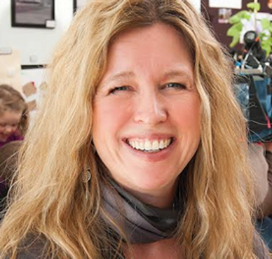 Photo of a woman with long blonde hair