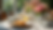 Eye-level view of a beautifully set brunch table with flowers and elegant tableware