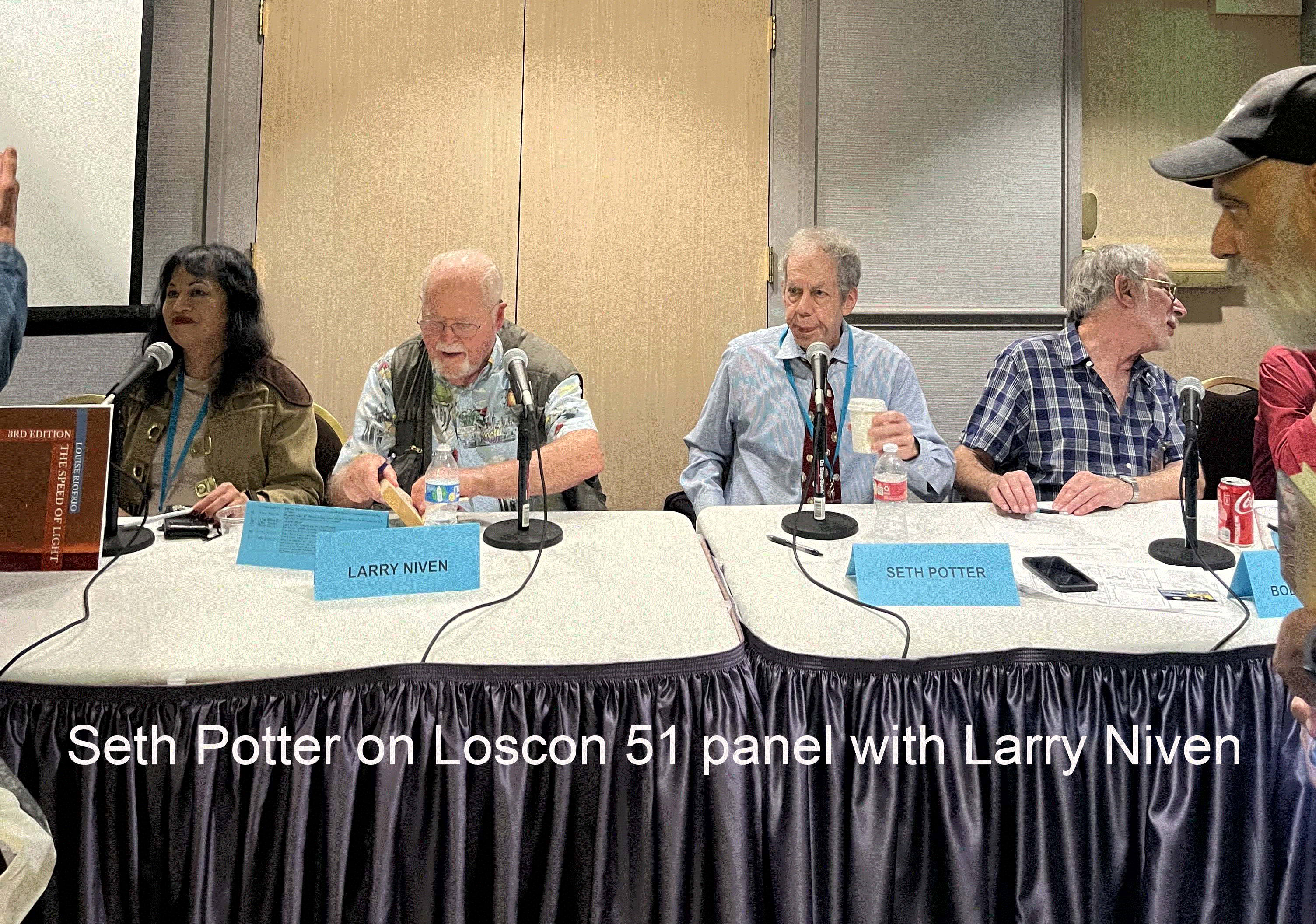 Seth Potter on Loscon 51 panel with Larry Niven.gif