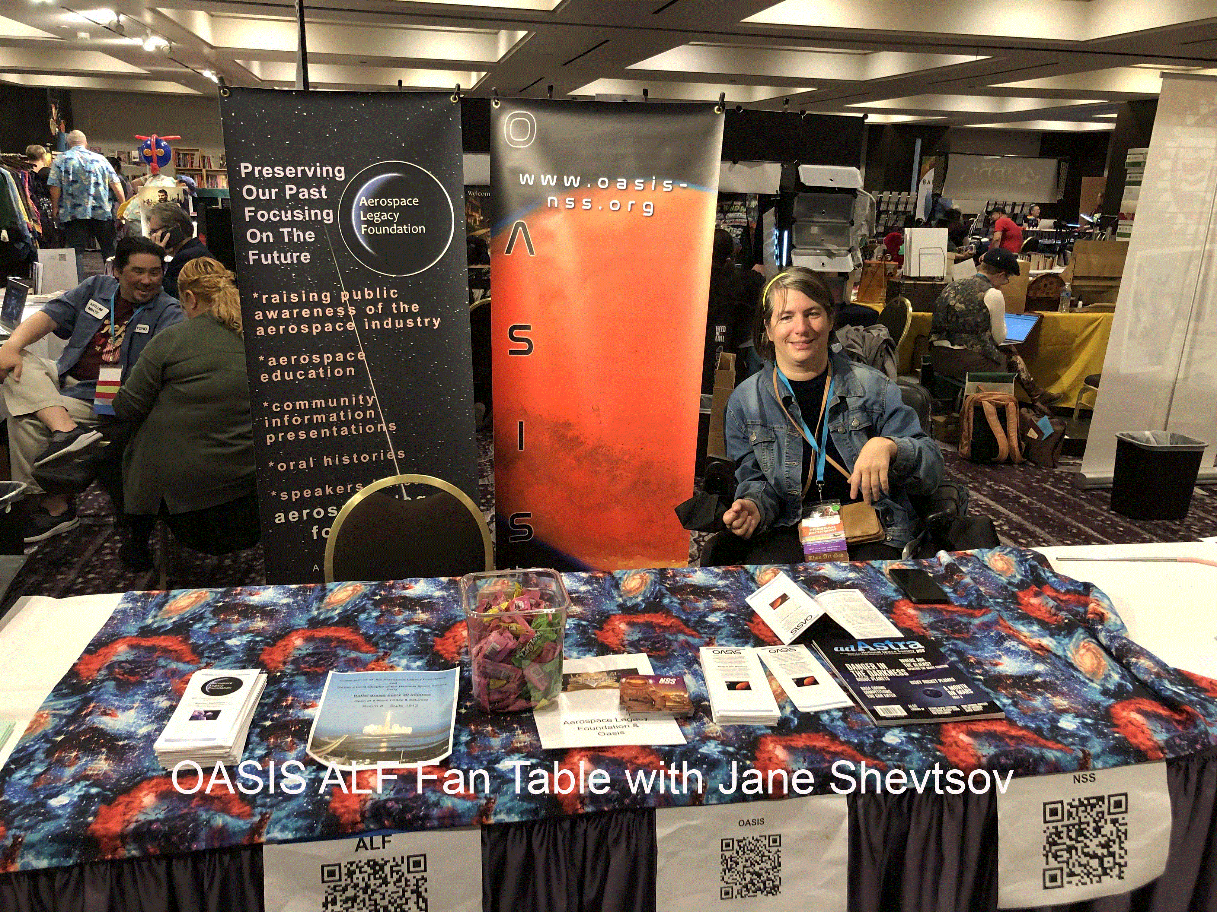 OASIS ALF table at Loscon 51 with Jane Shevtsov.gif