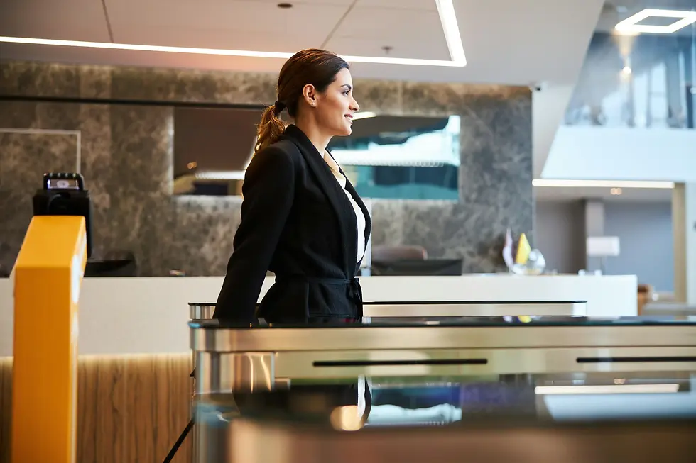 Corporate employee undergoing a security check with a private security officer, showcasing effective security risk assessment and compliance measures.