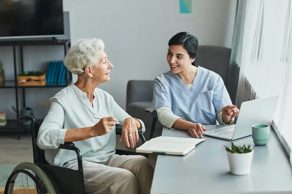 Senior man and caregiver playing a board game, demonstrating Fort Worth elder care benefits like improved socialization and mental stimulation.