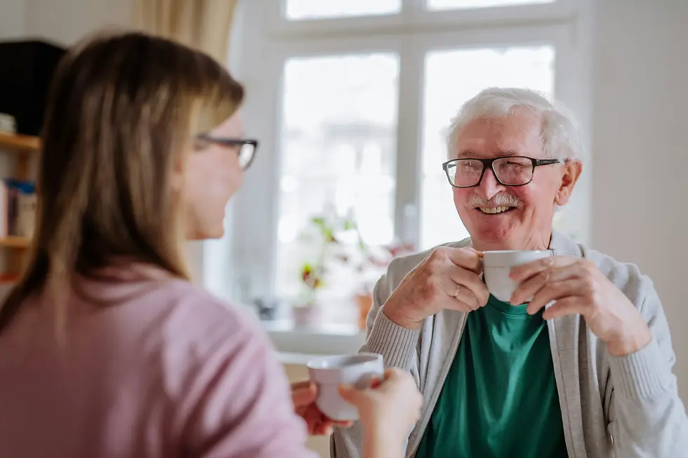 Smiling senior woman and caregiver sharing a joyful moment, highlighting what respite care is with Texas Angels Home Care's in-home care.