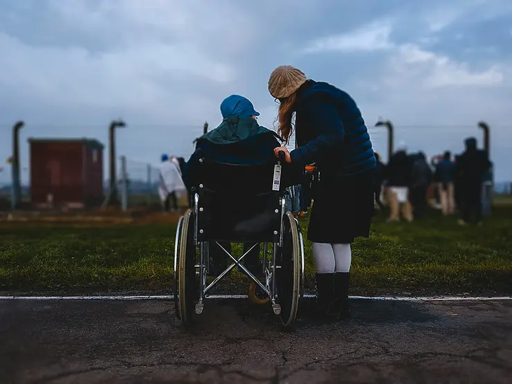 Elderly couple reading a long-term care report together at home, highlighting the importance of Fort Worth senior care planning.