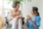 A caregiver and client share a warm moment, symbolizing the strong relationships fostered through ADL services and Fort Worth elder care, ensuring top-notch in-home care and homecare assistance.