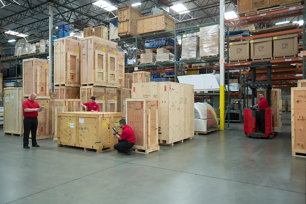 Piedmont Moving Systems commercial movers carefully packing fine art for secure transportation, showcasing expertise in specialized moving services and white glove delivery.