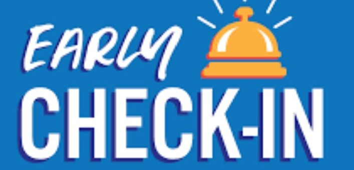 Two red drinks on tray with a bottle and rolled towels Ocean Breeze