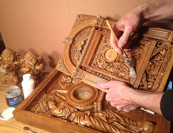 Titanic sculptor Alan St George puts finishing touches on the Grand Staircase replicas in Golden Oak custom color