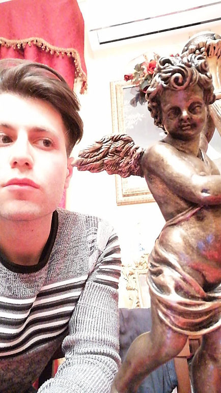 Gabriel Marco Vella, Titanic collector, of Sicily, Italy with cherub lamp replica by Alan St George, USA