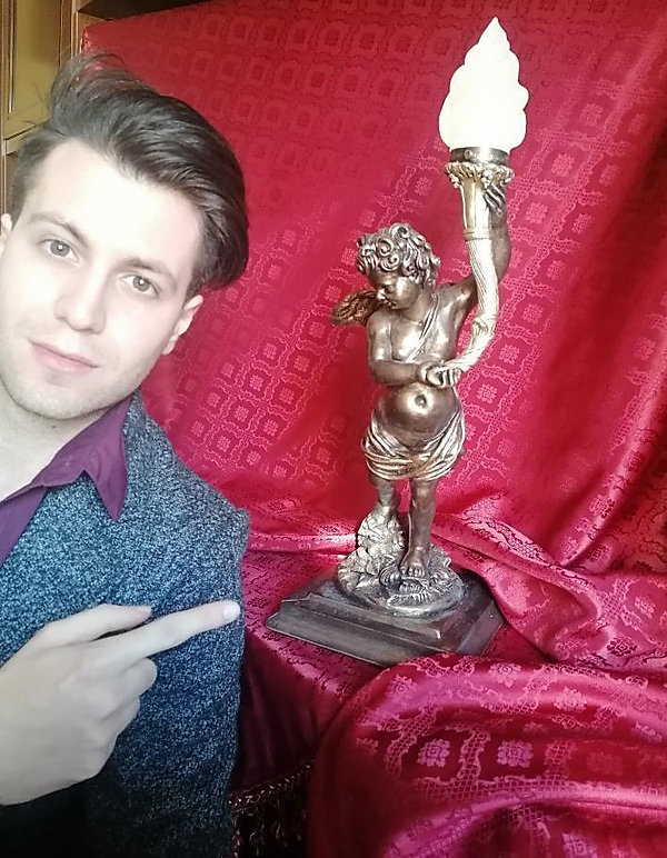 Gabriel Marco Vella, Titanic collector, of Sicily, Italy with cherub lamp replica by Alan St George, USA