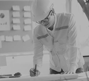 Engineer Looking At Blueprint_edited.jpg