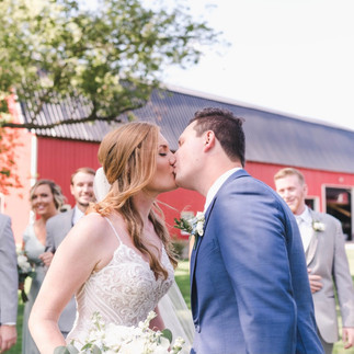 bride-groom-bridal-party-red-barn.jpeg
