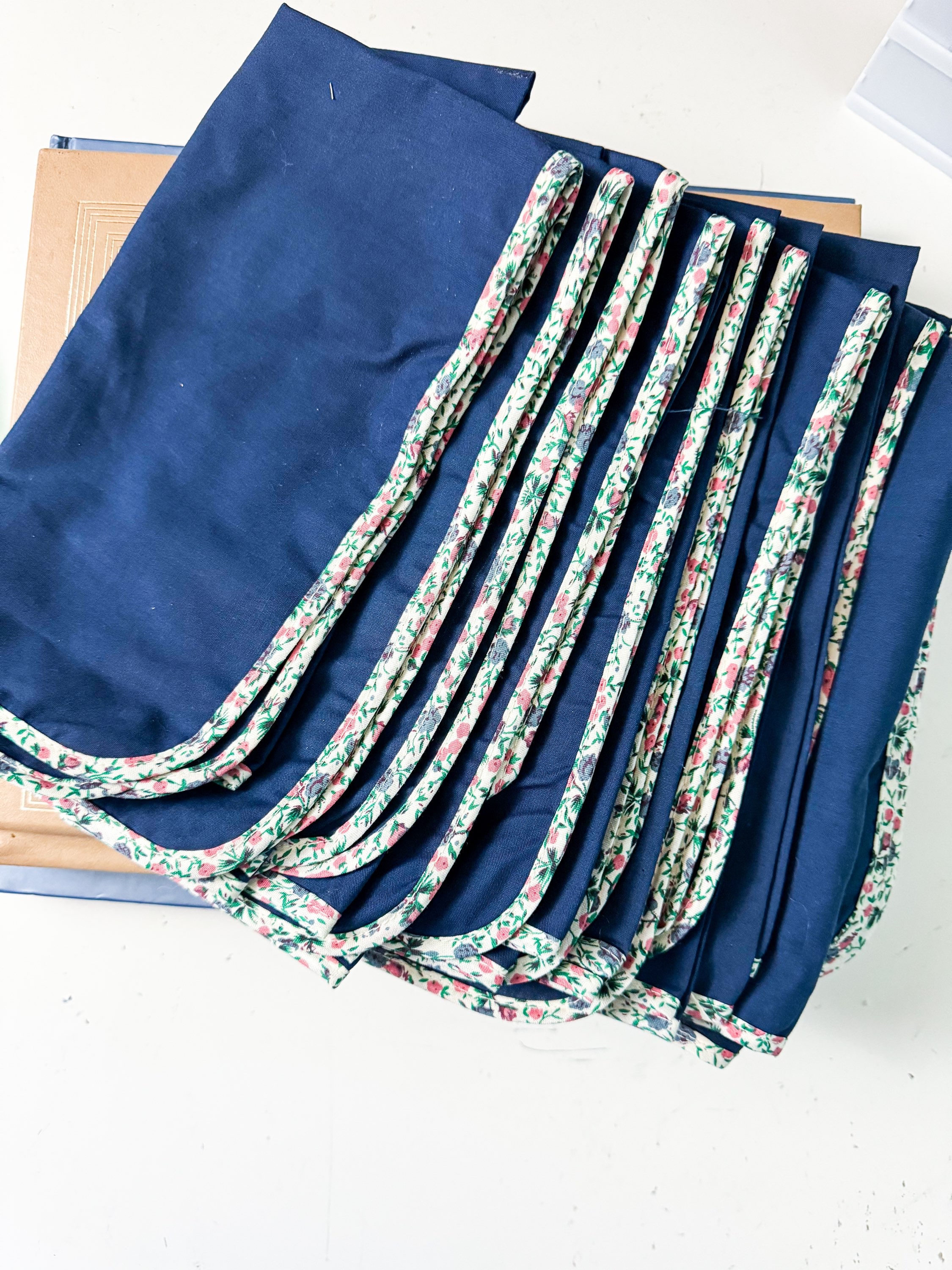 Navy cloth napkins with floral border