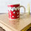 Thumbnail: Vintage Valentine’s Mug - red with white hearts 