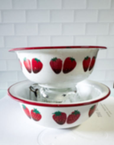 Pair of strawberry enamel bowls