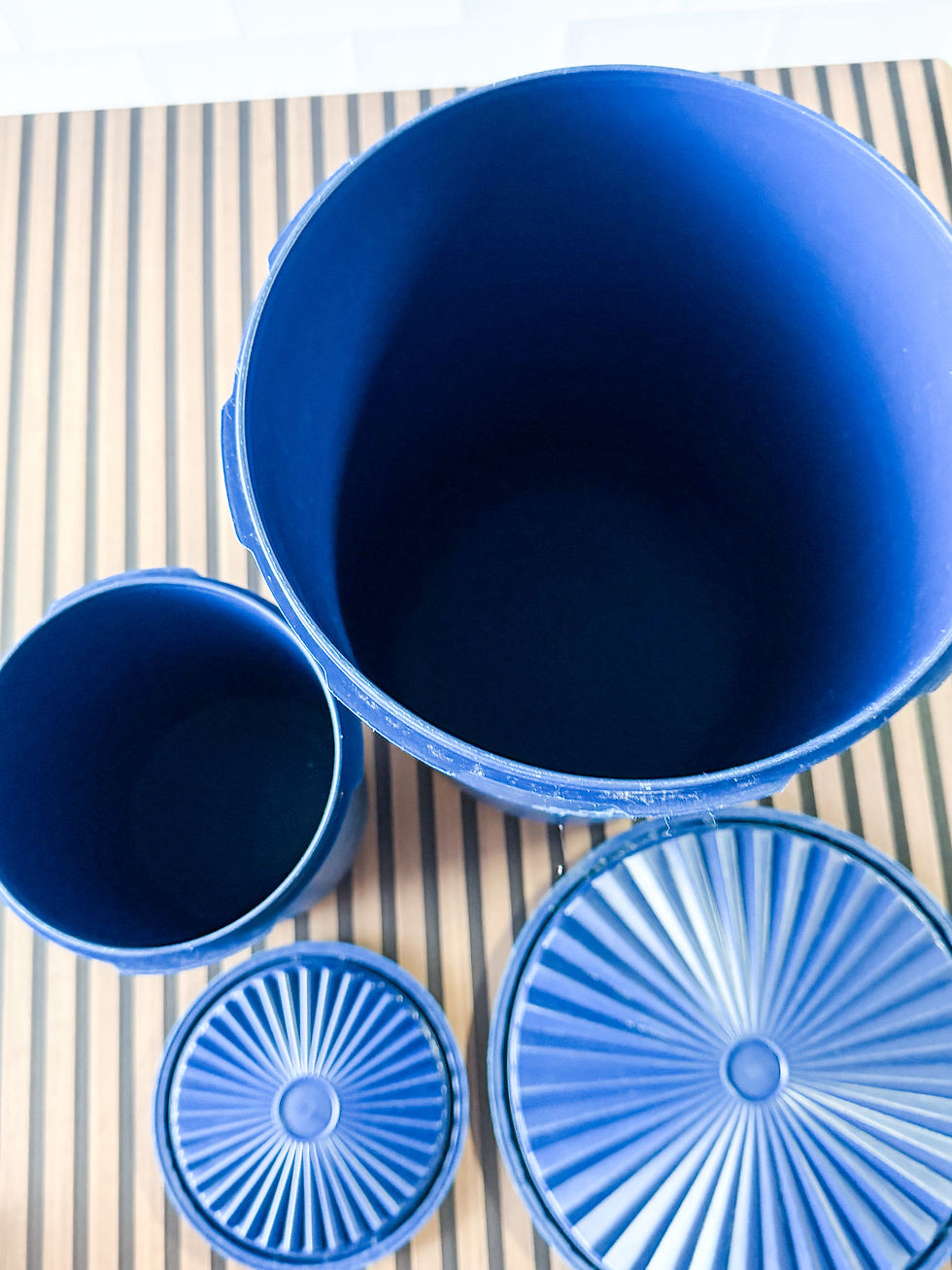 Thumbnail: Pair of navy blue vintage Tupperware canisters