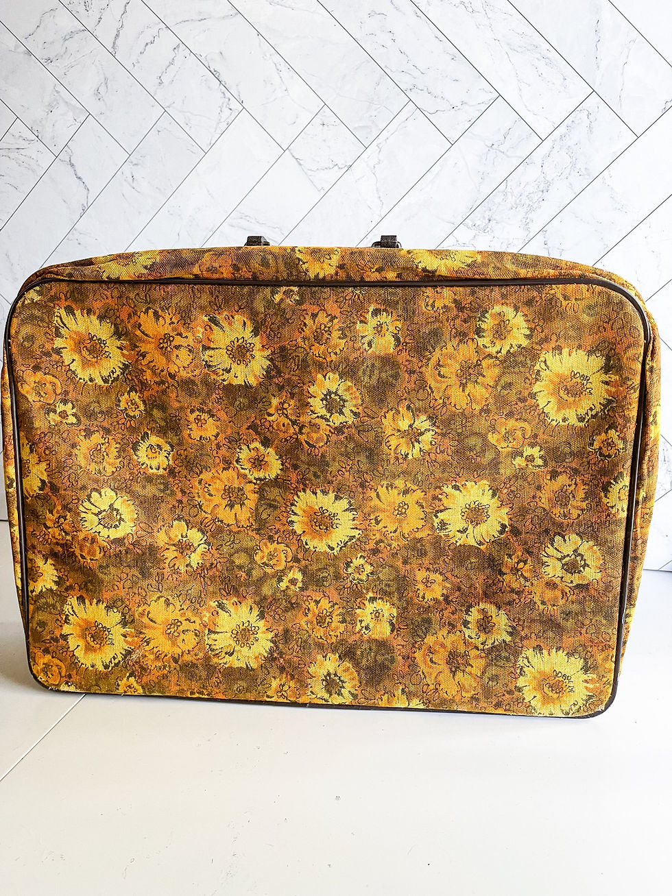 Thumbnail: Vintage floral suitcases