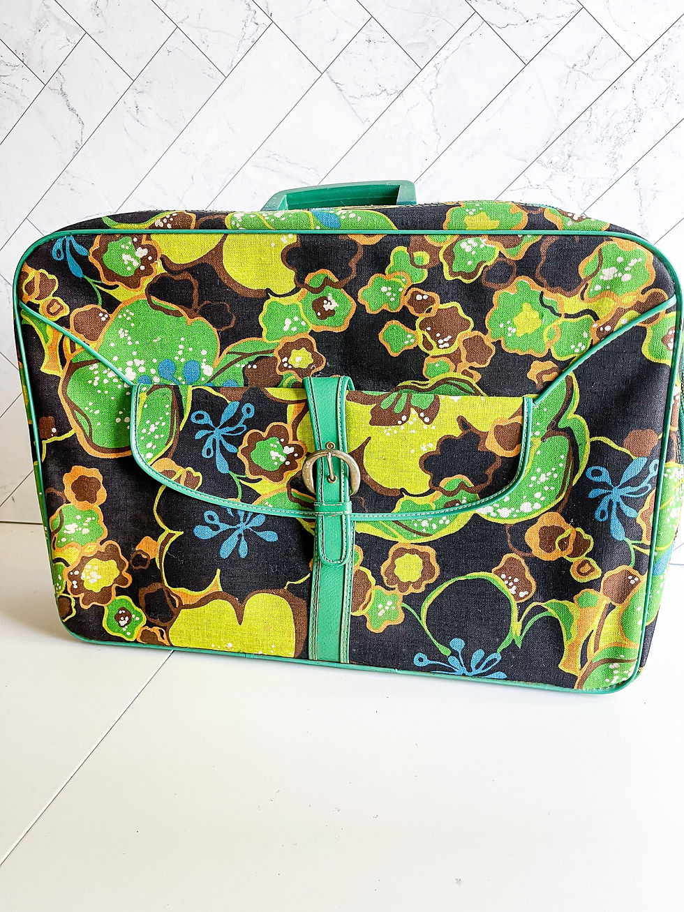 Thumbnail: Vintage floral suitcases