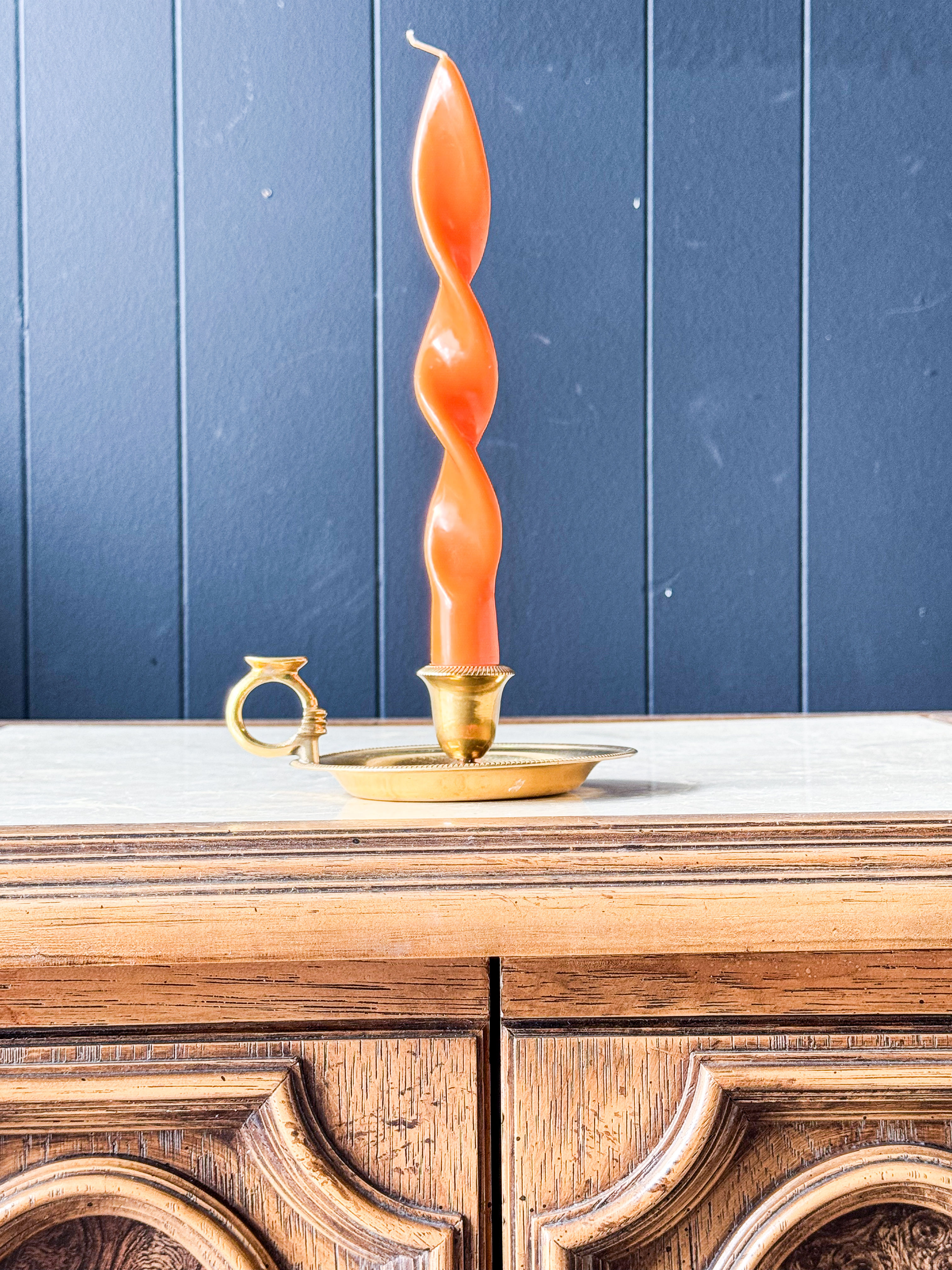 Brass candle holder with ring for carrying