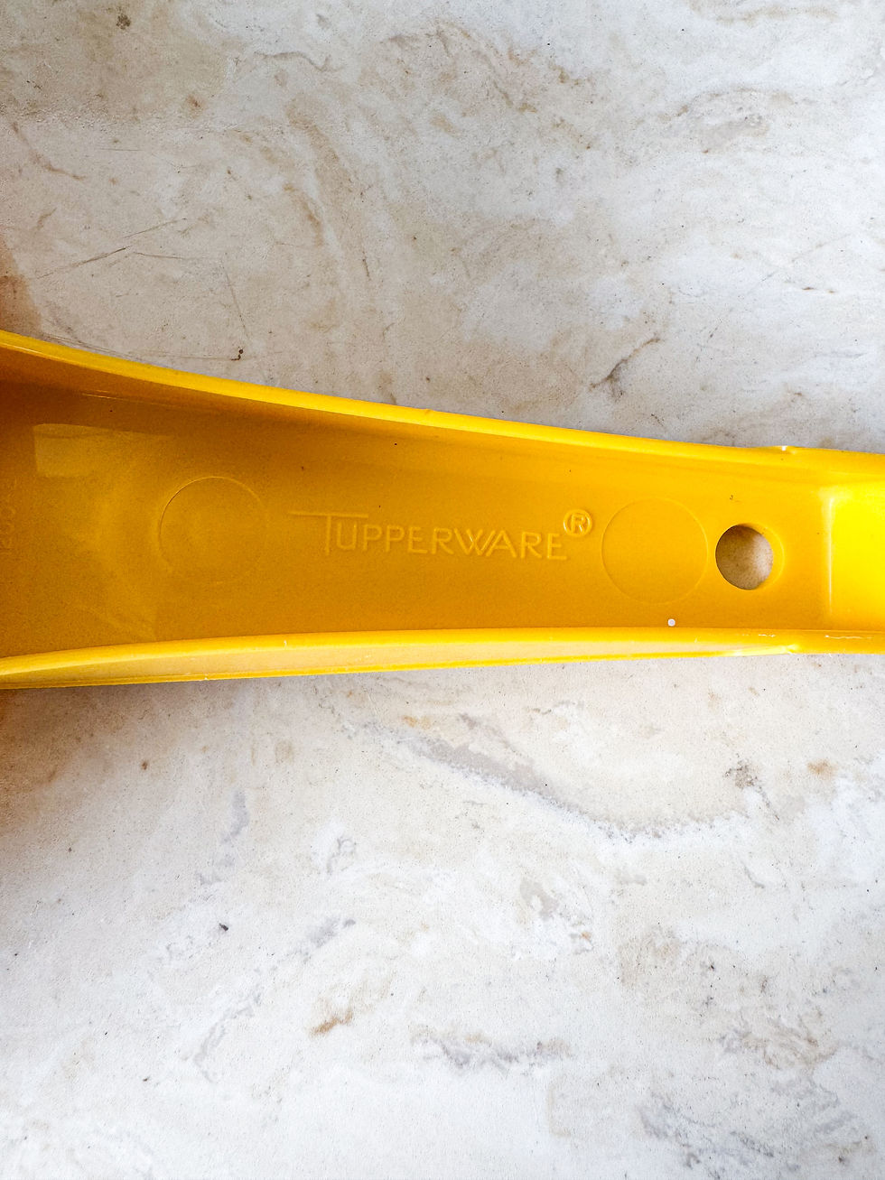 Thumbnail: Yellow Tupperware colander 