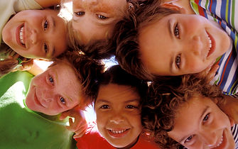 Kids looking down at camera