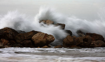 Waves Hitting Rocks