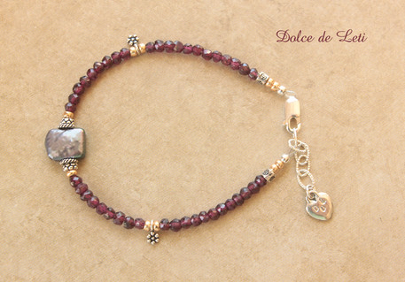 Garnet & Peacock pearl, Silver