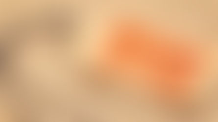 Gift tag with "HOLIDAY GIFT GUIDE" text in red on burlap background. Brown string attached, evoking a warm, festive mood.