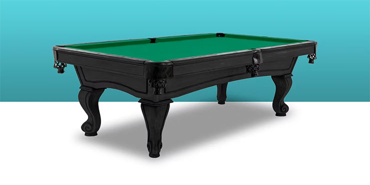Black pool table with green felt on a white and blue gradient background. Elegant carved legs. No visible text.