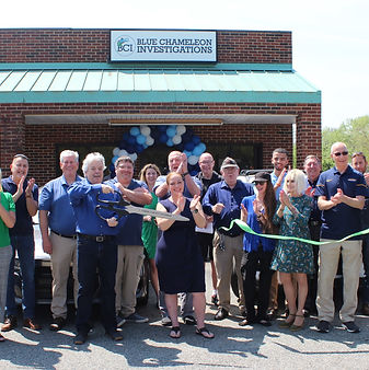 blue chameleon investigations team at ribbon cutting ceremony for the main office