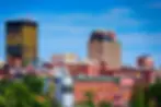 A sky line view of Manchester, NH including 2 high rise buildings