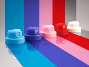 Multiple colors of Europa Two Piece Button Actuators, Summit Packaging